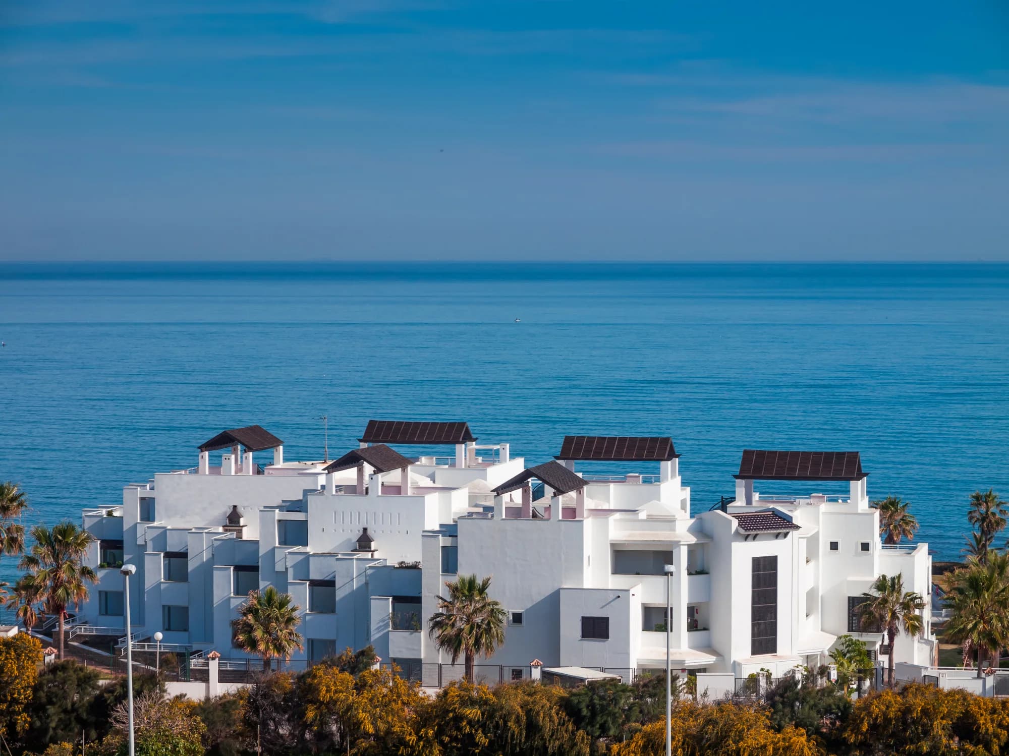 Whitewashed Mediterranean villas overlooking the sea on Spain's Costa del Sol near Marbella